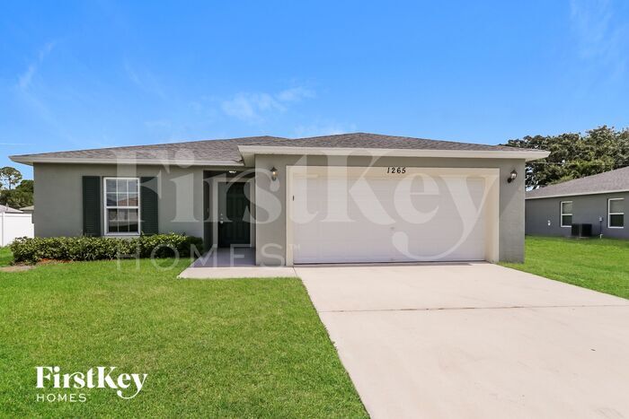 1265 SW Century Ave in Port St. Lucie, FL - Building Photo