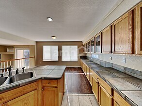 4892 Waldenwood Dr in Littleton, CO - Building Photo - Building Photo