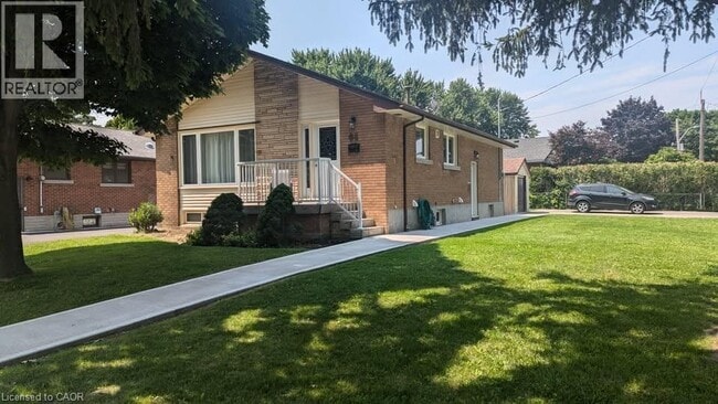 property at 64 W 25th St