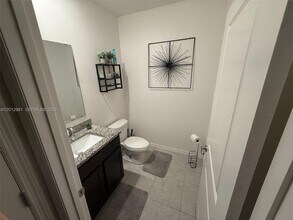 1557 SW Dycus Ave in Port St. Lucie, FL - Building Photo - Building Photo