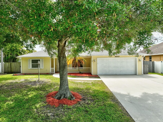 property at 6640 NW Omega Rd