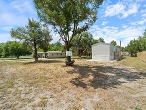 1038 Canopy Ln SW in Moore Haven, FL - Building Photo - Building Photo