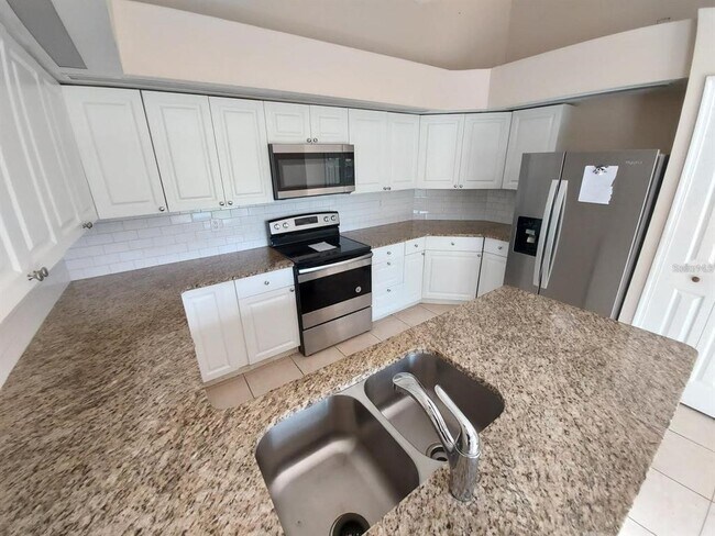 1401 Sugar Cane Dr in Kissimmee, FL - Building Photo - Building Photo