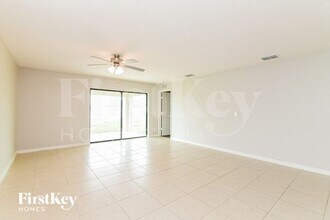1876 Amber Sweet Cir in Dundee, FL - Building Photo - Building Photo