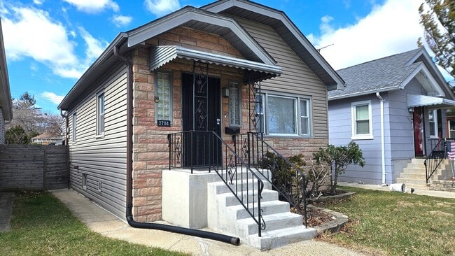 property at 2704 N New England Ave