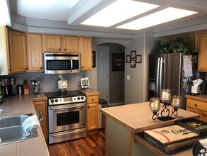 1408 W Briarhollow Ln in Littleton, CO - Building Photo - Building Photo