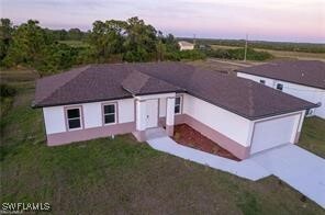 1249 Bari St E in Lehigh Acres, FL - Building Photo - Building Photo