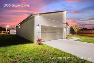 1930 Drum Dr in Poinciana, FL - Foto de edificio - Building Photo
