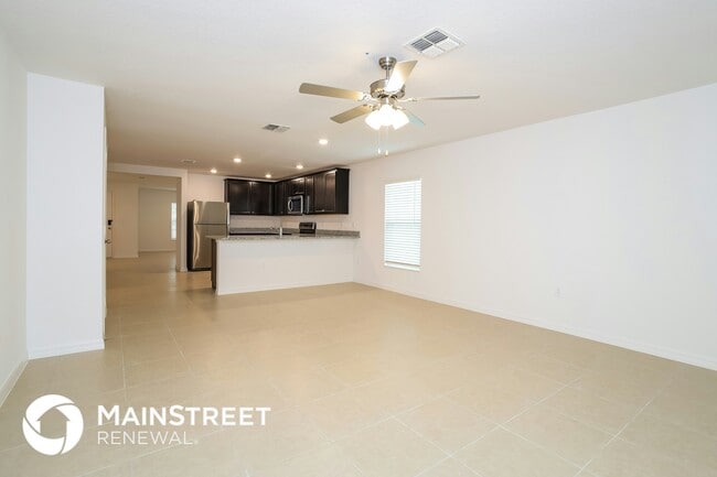 1661 Hideaway Flat St in Mascotte, FL - Building Photo - Building Photo