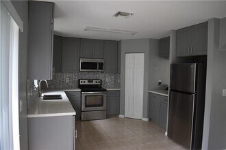 1199 Imperial Lake Rd in West Palm Beach, FL - Building Photo - Building Photo