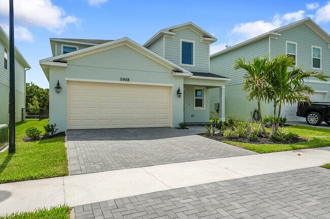 5908 NW Fairfax Ave in Port St. Lucie, FL - Building Photo - Building Photo