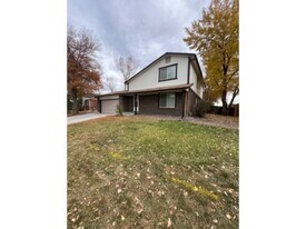 7644 S Holland Way in Littleton, CO - Building Photo