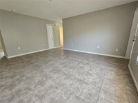 636 Olive St, Unit 1305 in Englewood, FL - Building Photo - Building Photo