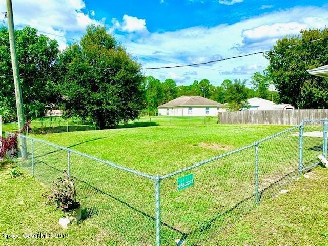 1006 Fairplay Ave NW in Palm Bay, FL - Foto de edificio - Building Photo