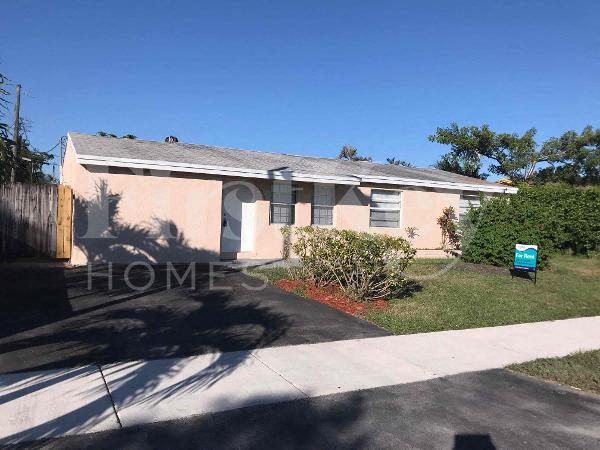 property at 4951 SW 16th St
