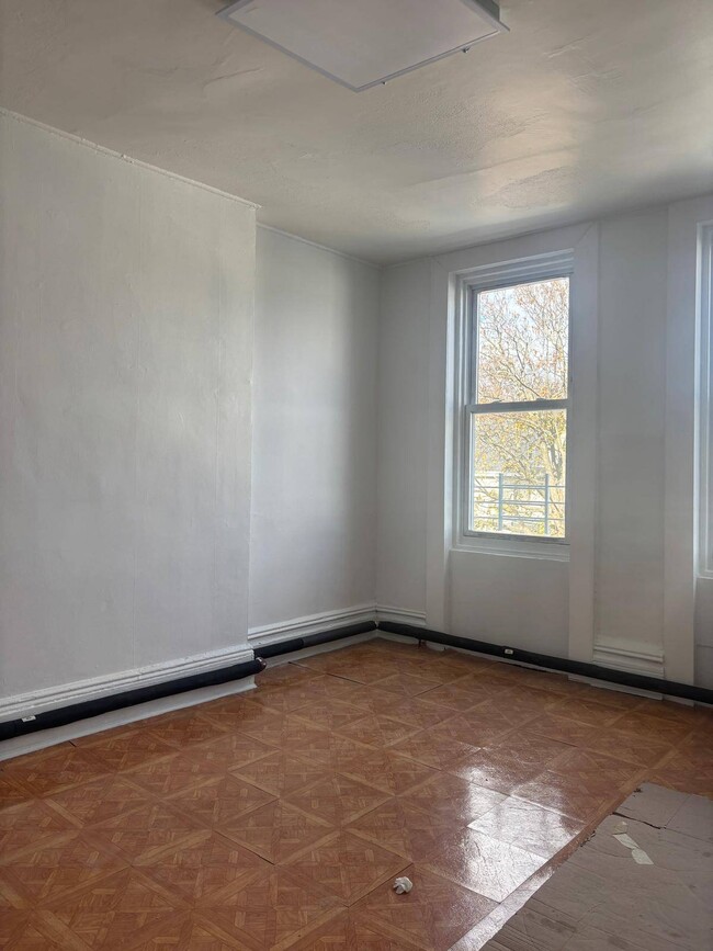 property at 88-13 Jamaica Ave