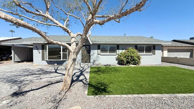 property at 8608 E Vernon Ave