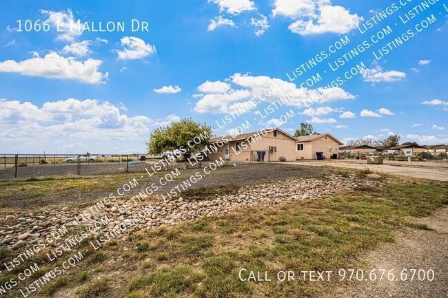 1066 E Mallon Dr in Pueblo, CO - Building Photo - Building Photo