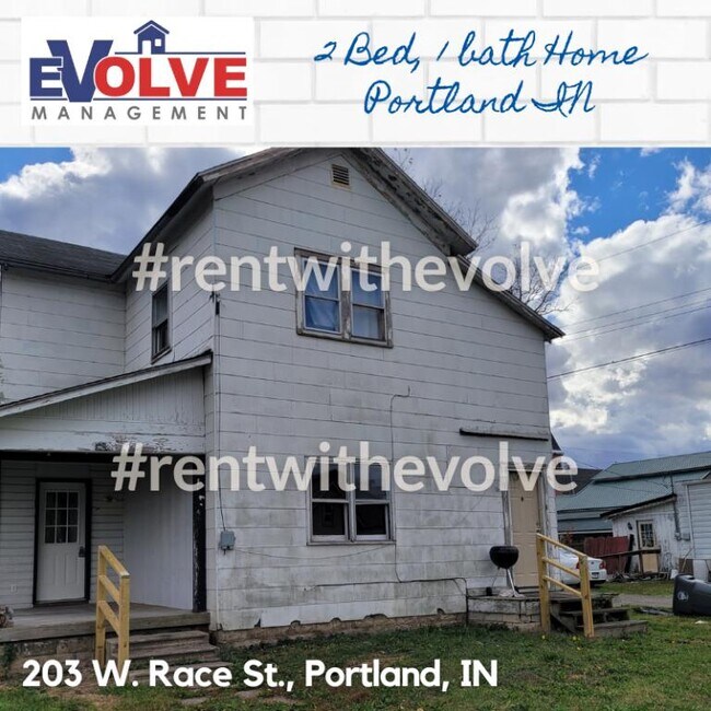 property at 203 W Race St