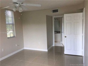 11177 SW 8th St-Unit -1F in Pembroke Pines, FL - Building Photo - Building Photo
