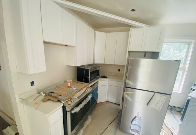 74 Marine Rd, Unit 2 in Boston, MA - Foto de edificio - Building Photo