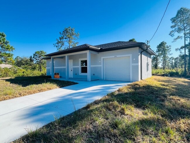 1114 Cellini St E in Lehigh Acres, FL - Building Photo - Building Photo