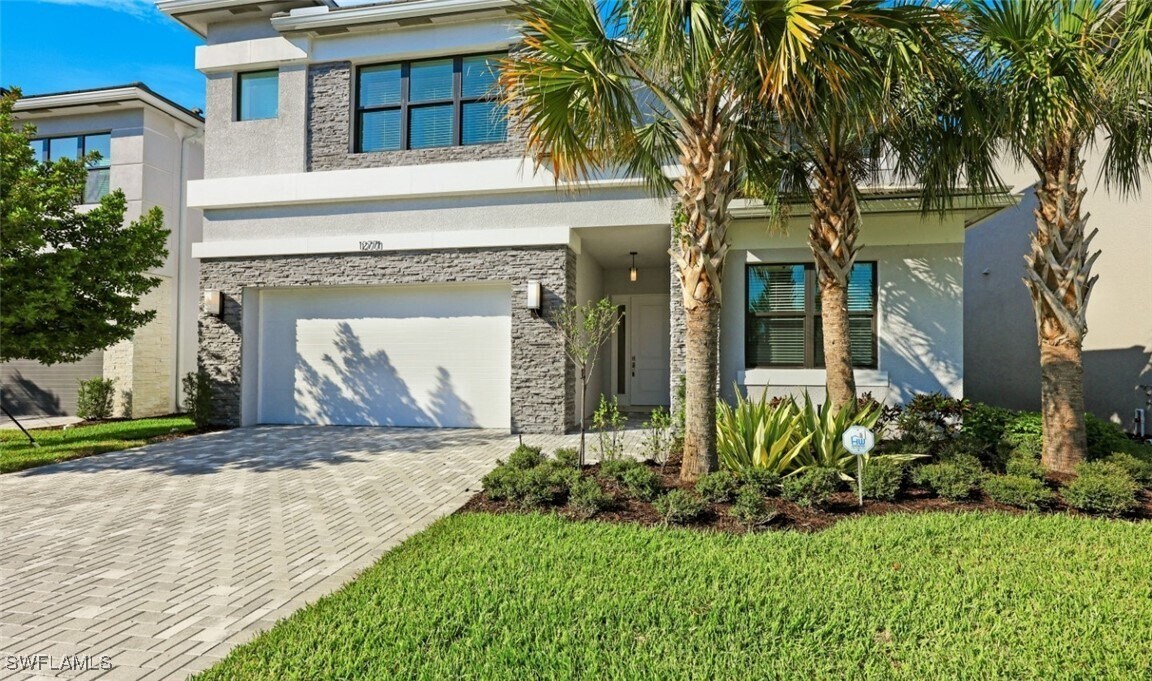 12771 Woodbury Dr in Estero, FL - Building Photo