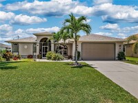 1706 SE 6th Ave in Cape Coral, FL - Foto de edificio - Building Photo