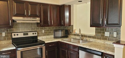 4328 Dunwood Terrace, Unit 075-01 in Burtonsville, MD - Building Photo - Building Photo