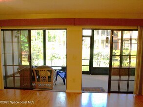 831 Greenwood Manor Cir, Unit 8D in West Melbourne, FL - Foto de edificio - Building Photo