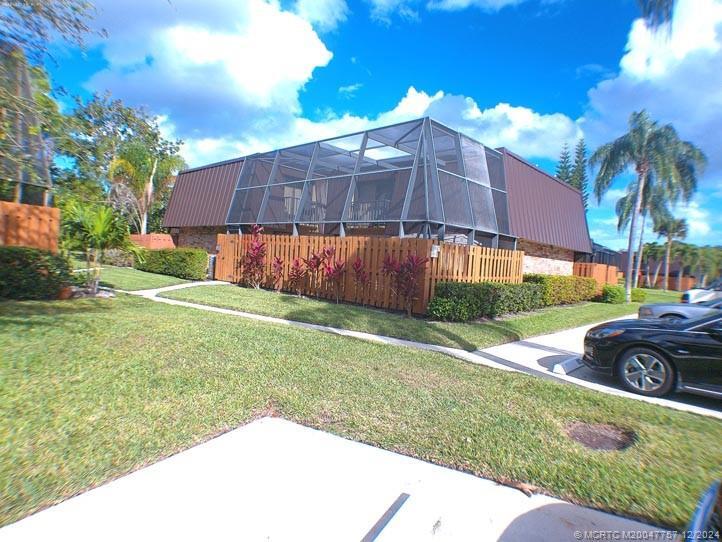 5947 SE Windsong Ln in Stuart, FL - Foto de edificio