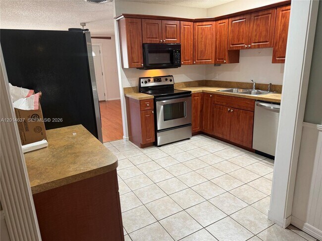 2240 NE Rustic Way in Jensen Beach, FL - Building Photo - Building Photo