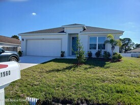 1560 Gardenton St NW in Palm Bay, FL - Building Photo