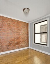 436 W 52nd St, Unit 13E in New York, NY - Building Photo - Building Photo
