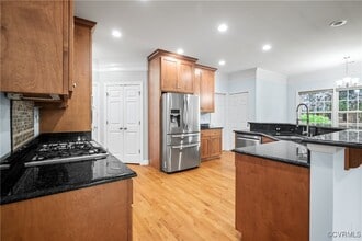 11465 Pinewild Dr in Providence Forge, VA - Foto de edificio - Building Photo