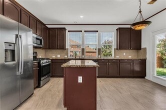 6902 Amesbury Ln in Rowlett, TX - Building Photo - Building Photo