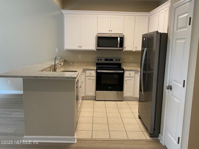 5697 Parkstone Crossing Dr in Jacksonville, FL - Building Photo - Building Photo