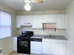 1247 W 37th St in Baltimore, MD - Building Photo - Building Photo