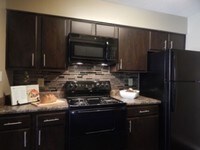 Building Photo - Plantations at Hillcrest Apartamentos in Mobile, Alabama