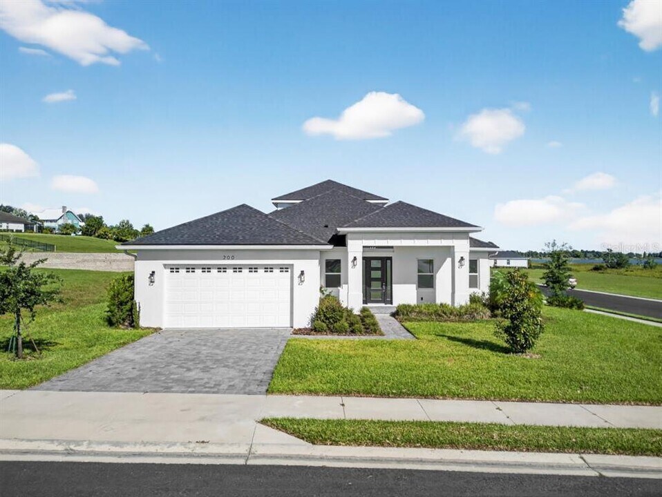 200 Snowy Orchid Way in Lake Alfred, FL - Building Photo