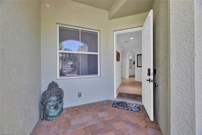 1415 Mariposa Cir-Unit -102 in Naples, FL - Building Photo - Building Photo