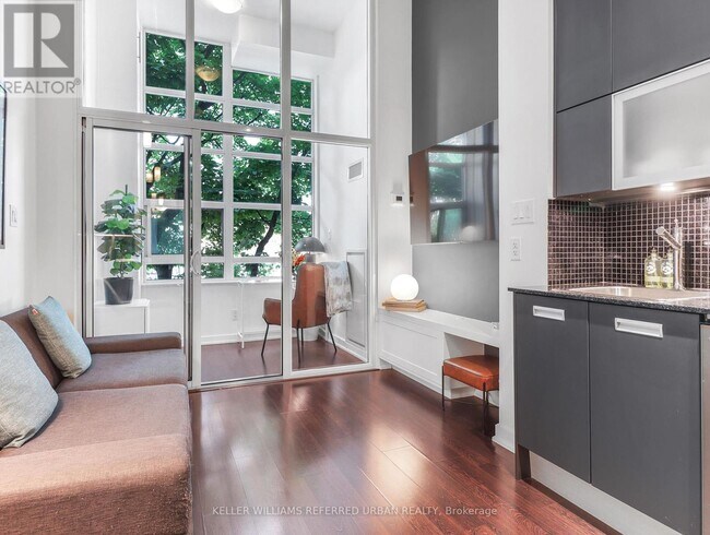 property at 380-380 Macpherson Ave