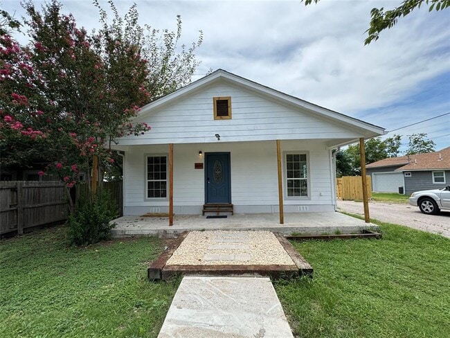 property at 414 E 3rd St