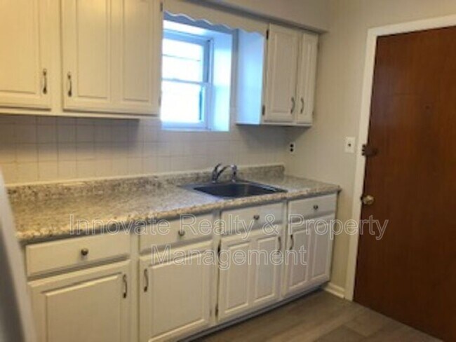 property at 7950 Oxford Ave