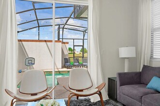 8969 Stinger Dr, Unit SI ID1502695P in Four Corners, FL - Building Photo - Building Photo