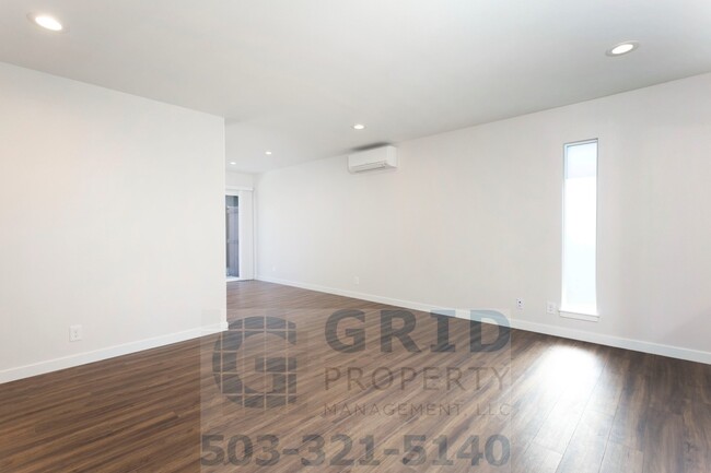 property at 2943-2947-2947 NE Everett St