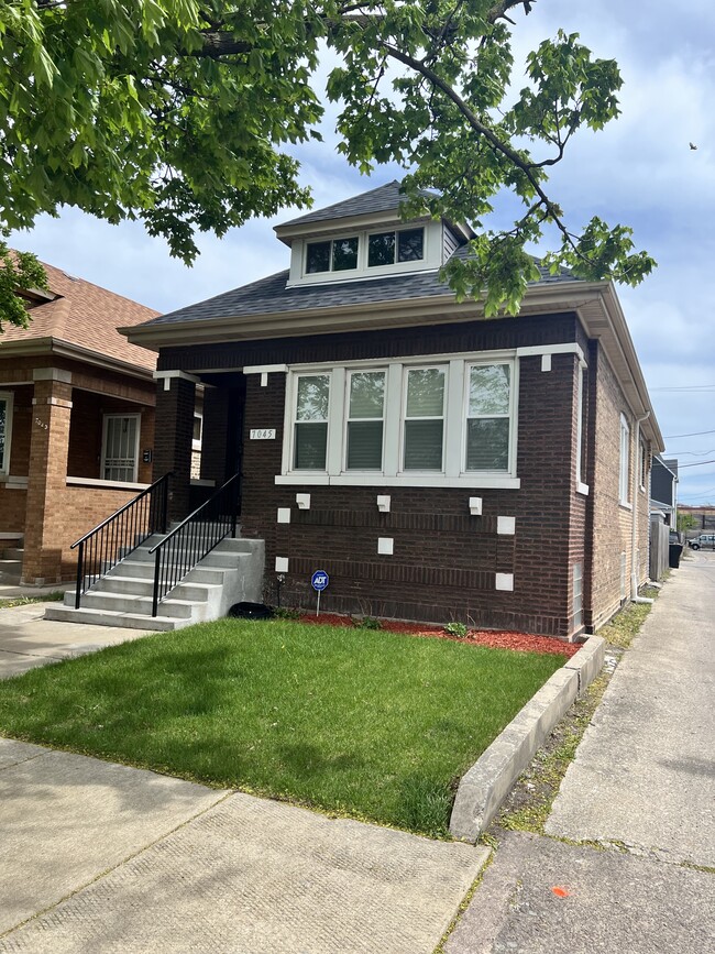 property at 7045 S Oakley Ave