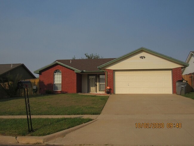property at 205 SE Heather Ln
