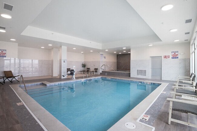 The Crimson - Lavish Living in Sioux Falls, SD - Building Photo - Building Photo