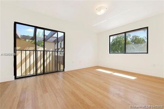 9717 Costa Del Sol Blvd-Unit -B-100 in Doral, FL - Building Photo - Building Photo